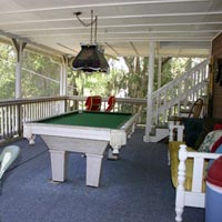 screened porch and pool table